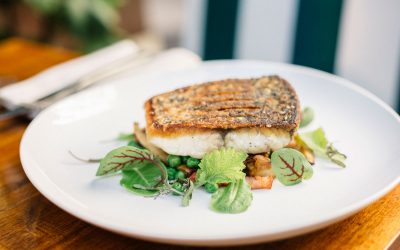 Pan-roasted barramundi with bacon, mushrooms and peas